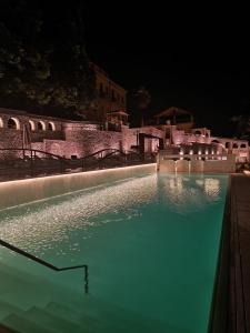 Bazén v ubytování Hotel Corte dei Tini nebo v jeho okolí