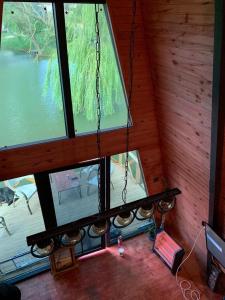 an overhead view of a room with a chandelier hanging from the ceiling at Secret Lake Tayakadın in Arnavutköy