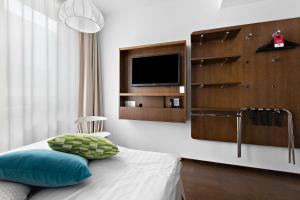 TV a/nebo společenská místnost v ubytování Best Western Hotel Akersberga