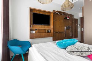 Postel nebo postele na pokoji v ubytování Best Western Hotel Akersberga