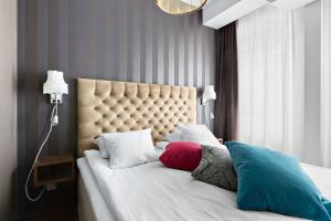 Postel nebo postele na pokoji v ubytování Best Western Hotel Akersberga