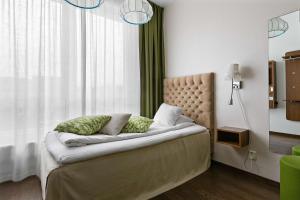 Postel nebo postele na pokoji v ubytování Best Western Hotel Akersberga