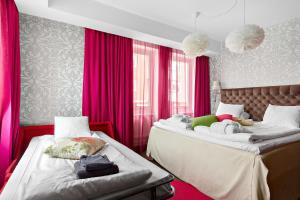 Postel nebo postele na pokoji v ubytování Best Western Hotel Akersberga