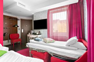 Postel nebo postele na pokoji v ubytování Best Western Hotel Akersberga