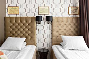 Postel nebo postele na pokoji v ubytování Best Western Hotel Akersberga