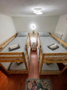Postel nebo postele na pokoji v ubytování Cadore apartment
