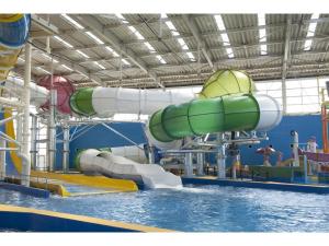 a large water slide in a water park at Spa World HOTEL&RESORT in Osaka