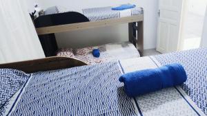 Cama ou camas em um quarto em Hostel da Floresta