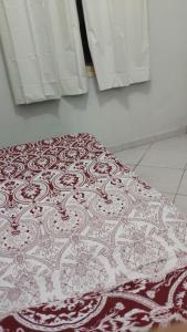 Cama ou camas em um quarto em Hostel da Floresta