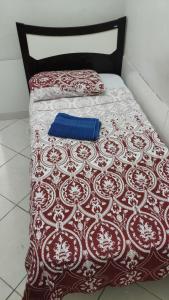Cama ou camas em um quarto em Hostel da Floresta