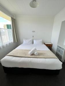 Postel nebo postele na pokoji v ubytování Bings Motel