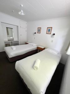 Postel nebo postele na pokoji v ubytování Bings Motel