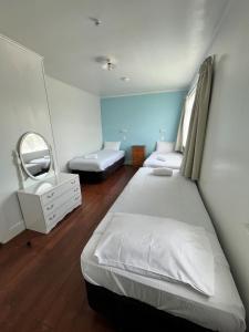 Postel nebo postele na pokoji v ubytování Bings Motel