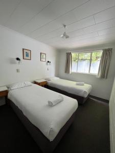Postel nebo postele na pokoji v ubytování Bings Motel