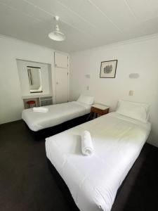 Postel nebo postele na pokoji v ubytování Bings Motel