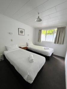 Postel nebo postele na pokoji v ubytování Bings Motel