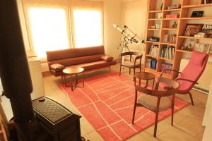 a living room with a couch and chairs at Farm Inn Torch A - Vacation STAY 92716v in Tsurui