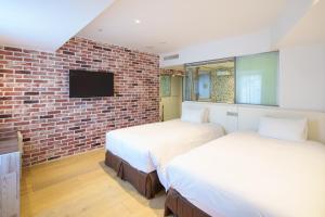 TV a/nebo společenská místnost v ubytování EN Hotel Shibuya