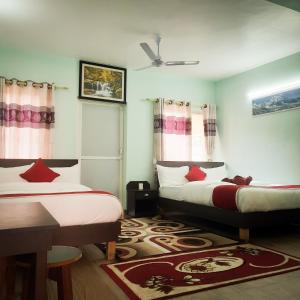 Letto o letti in una camera di Hotel Elite Pokhara
