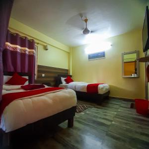 Letto o letti in una camera di Hotel Elite Pokhara