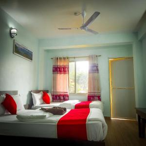 Letto o letti in una camera di Hotel Elite Pokhara