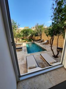 Bazén v ubytování Palazzo Pisani Malta Boutique and SPA nebo v jeho okolí