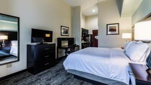 TV a/nebo společenská místnost v ubytování Staybridge Suites Laredo by IHG