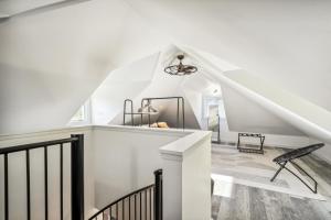 a staircase in a house with white walls at Luxury River Home - Pets Stay Free in Monte Rio