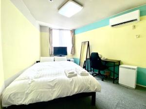 Krevet ili kreveti u jedinici u okviru objekta HendaKara Hotel