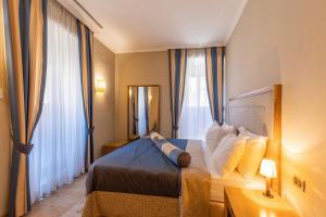 Katil atau katil-katil dalam bilik di Hotel Vardar