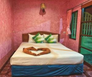 Cama o camas de una habitación en Sangtawan Resort