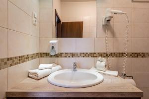 Kúpeľňa v ubytovaní Elit Boutique Rooms- Best Location by BQA