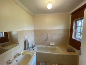 Ένα μπάνιο στο Malutizicht Lodge +67 φωτογραφίες