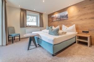 Postel nebo postele na pokoji v ubytování Garni Ötztal ROOMS & APARTS