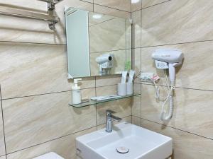 Phòng tắm tại Hourlight Homestay