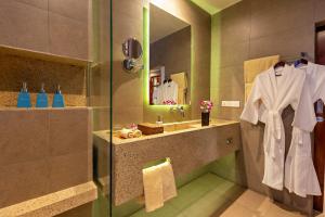 Vannituba majutusasutuses Indra Hotel