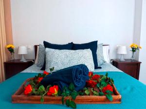 A bed or beds in a room at Casa Familiar para 10 con jardín, bbq, terraza, piscina y playa cerca