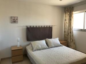 Posteľ alebo postele v izbe v ubytovaní Appartement spacieux et calme classé 4 etoiles, à 300m de la mer