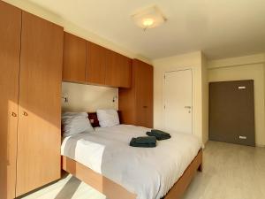 Postel nebo postele na pokoji v ubytování Residentie Laurence - 'SEAGIRL'