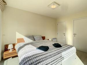 En eller flere senge i et værelse på Residentie Laurence - 'SEAGIRL'