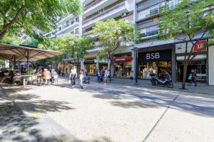 a group of people walking down a city street at Ag.Sofias pedestrian area luxury ap. & big balcony in Thessaloniki