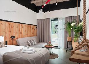 Posteľ alebo postele v izbe v ubytovaní Salio Equisport Resort