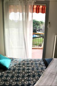 Katil atau katil-katil dalam bilik di Bel appartement terrasse au 4ème et dernier étage +14 gambar