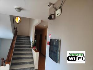 TV a/nebo společenská místnost v ubytování Lanterna Verde