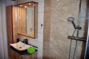 Ein Badezimmer in der Unterkunft Ferienwohnung Zudar auf Rügen