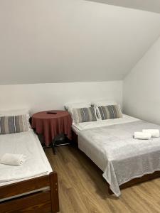 Łóżko lub łóżka w pokoju w obiekcie Motel S7