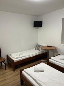Łóżko lub łóżka w pokoju w obiekcie Motel S7
