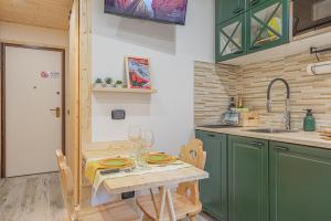 Η κουζίνα ή μικρή κουζίνα στο Casa SOLE- Loft moderno in montagna