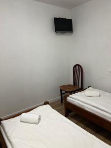 Łóżko lub łóżka w pokoju w obiekcie Motel S7