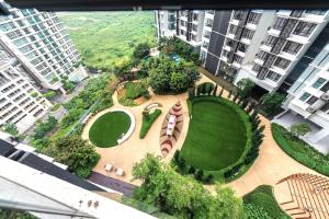 an aerial view of a park in a city at Cyberjaya Menara Eclipse Fully Air Con Suite with Garden View, Cyber 11, 63000 Cyberjaya in Cyberjaya
